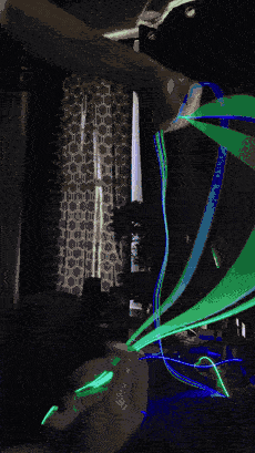 Trippy Wire spun by hand, the strands smearing into solid sheets of blue and green.