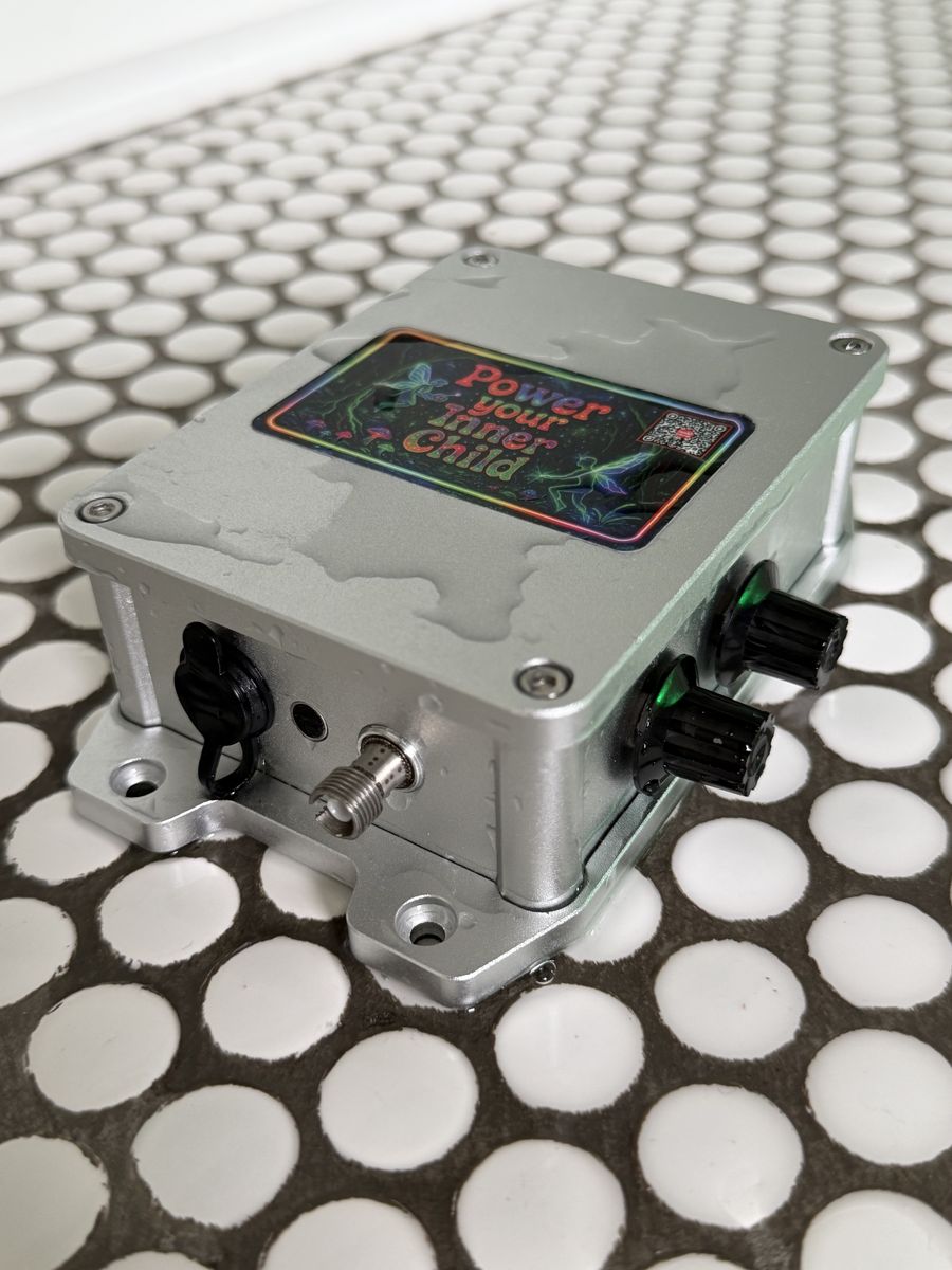 The illuminator housing beaded with water.